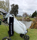 a golf bag with a black golf towel
